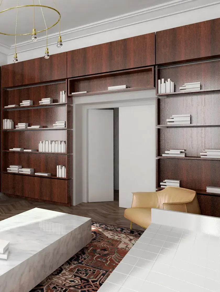A rendering of a custom built red millwork library, with double doors nestled in