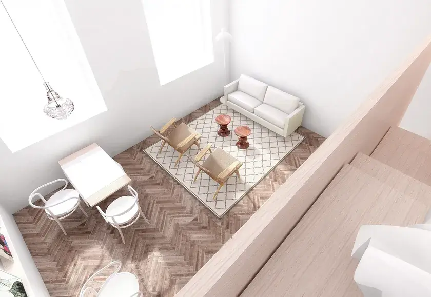 A rendering of the view from a mezzanine overlooking an open concept living / dining area with herringbone floors